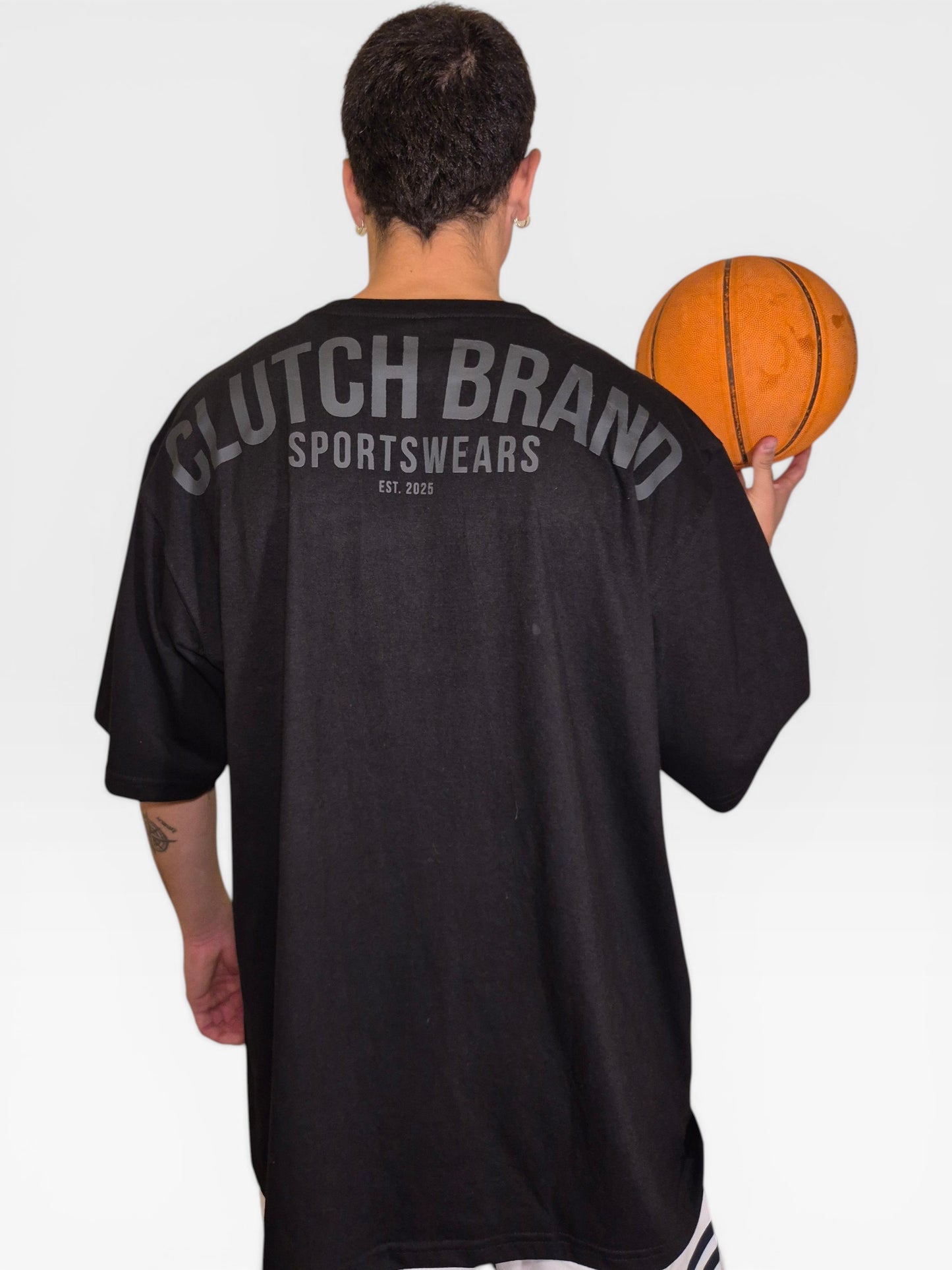 POLERA OVERSIZE "SPORTSWEAR" NEGRA